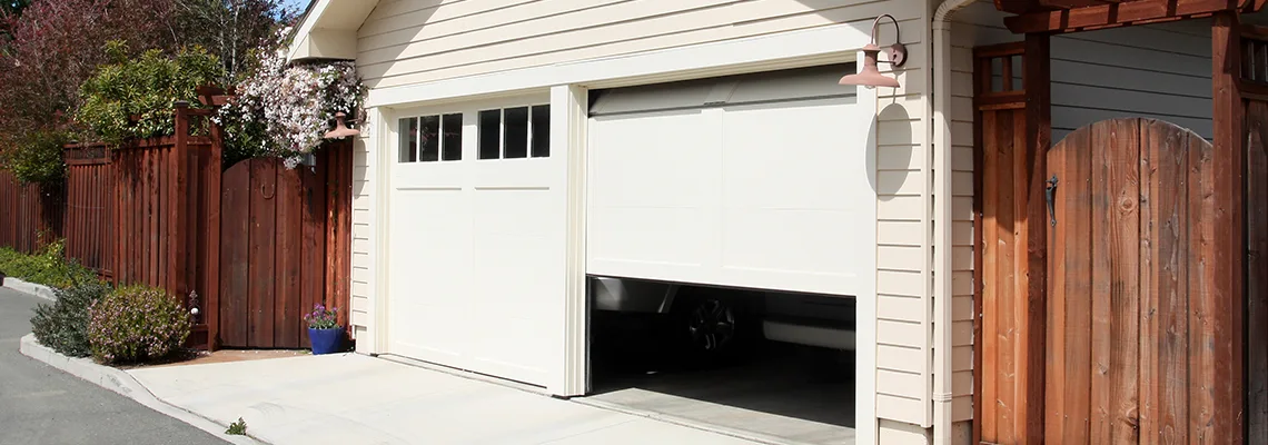 Fix Metal Garage Door Jerking in Palatine, Illinois